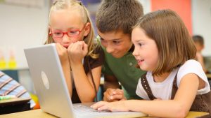KidsInteractingWithComputer